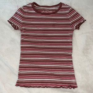 Xs shrunken, striped tee from Aeropostale. laced on the sleeves and bottom.